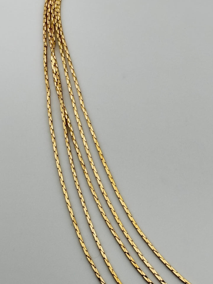 Gold Multi-Layer Necklace Earring Set with Layered Chains and Round Studs